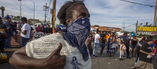 People gather to mourn for rapper Nipsey Hussle, 33, on April 1, 2019 in Los Angeles, California - Sputnik International