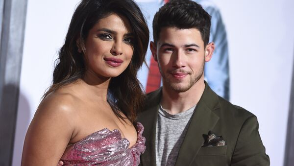 Cast member Priyanka Chopra and her husband Nick Jonas arrive at the Los Angeles premiere of Isn't It Romantic at The Theatre at Ace Hotel on Monday, Feb. 11, 2019 - Sputnik International
