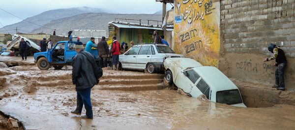 Damaged vehicles are seen after a flash flooding in Shiraz, Iran, March 26, 2019 - Sputnik International