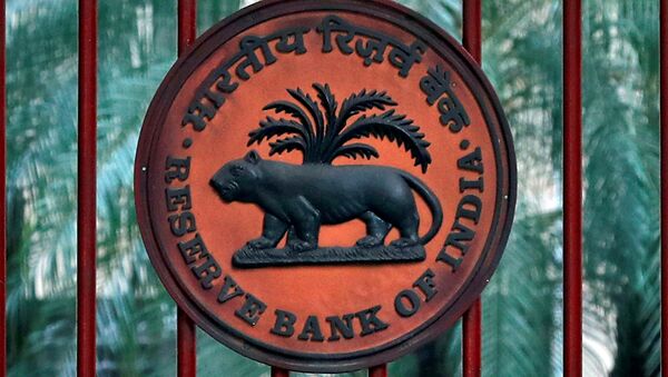 A Reserve Bank of India (RBI) logo is seen at the gate of its office in New Delhi, India, November 9, 2018 - Sputnik International
