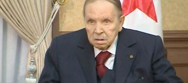 FILE PHOTO: Algeria's President Abdelaziz Bouteflika looks on during a meeting with army Chief of Staff Lieutenant General Gaid Salah in Algiers, Algeria, in this handout still image taken from a TV footage released on March 11, 2019. - Sputnik International