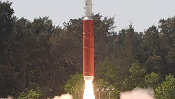 A Ballistic Missile Defence (BMD) Interceptor takes off to hit one of India's satellites in the first such test, from the Dr. A.P.J. Abdul Kalam Island, in the eastern state of Odisha, India, March 27, 2019 - Sputnik International