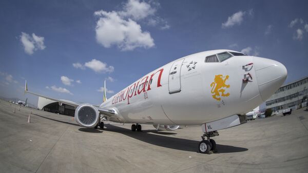 An Ethiopian Airlines Boeing 737 Max 8 sits grounded at Bole International Airport in Addis Ababa, Ethiopia Saturday, March 23, 2019 - Sputnik International