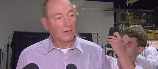 In this image made from video, a teenager breaks an egg on the head of Senator Fraser Anning while he holds a press conference, Saturday, March 16, 2019, in Melbourne, New Zealand In this image made from video, a teenager breaks an egg on the head of Senator Fraser Anning while he holds a press conference, Saturday, March 16, 2019, in Melbourne, New Zealand - Sputnik International