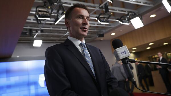 British Foreign Secretary Jeremy Hunt speaks with the media as he arrives at an EU Foreign Ministers' meeting at the European Council headquarters in Brussels, 18 February 2019 - Sputnik International