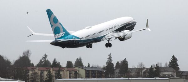 A Boeing 737 MAX 8 takes off during a flight test in Renton, Washington A Boeing 737 MAX 8 takes off during a flight test in Renton, Washington - Sputnik International