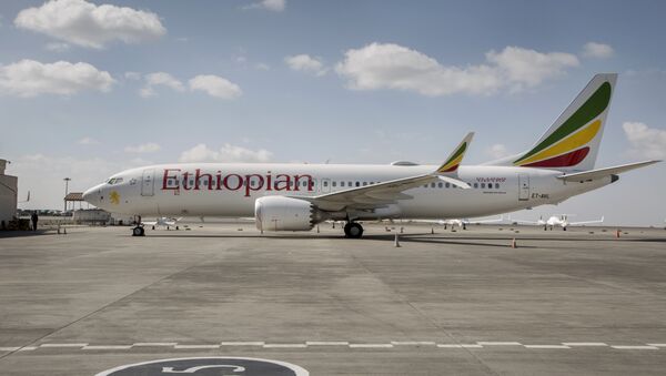 An Ethiopian Airlines Boeing 737 Max 8 sits grounded at Bole International Airport in Addis Ababa, Ethiopia Saturday, March 23, 2019 - Sputnik International