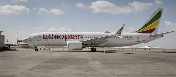 An Ethiopian Airlines Boeing 737 Max 8 sits grounded at Bole International Airport in Addis Ababa, Ethiopia Saturday, March 23, 2019 - Sputnik International