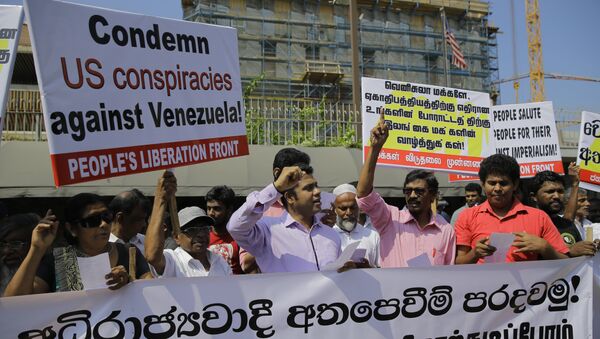 People's Liberation Front, members shout slogans against the U.S. during a protest in solidarity with Venezuelan president Nicolas Maduro outside the U.S. embassy in Colombo, Sri Lanka - Sputnik International
