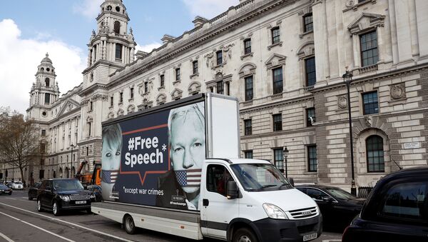 A truck carrying a poster relating to WikiLeaks founder Julian Assange, who has been living at Ecuador's embassy in London, drives through London, Britain April 3, 2019 - Sputnik International
