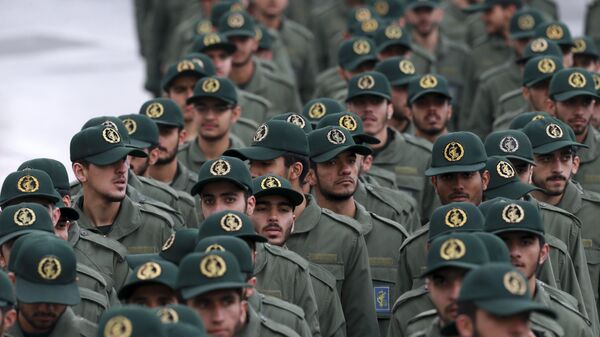 Iranian Revolutionary Guard members arrive for a ceremony celebrating the 40th anniversary of the Islamic Revolution, at the Azadi, or Freedom, Square, in Tehran, Iran, Monday, Feb. 11, 2019. - Sputnik International