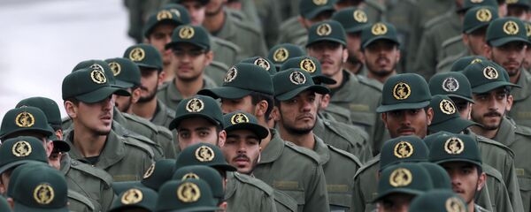 Iranian Revolutionary Guard members arrive for a ceremony celebrating the 40th anniversary of the Islamic Revolution, at the Azadi, or Freedom, Square, in Tehran, Iran, Monday, Feb. 11, 2019. - Sputnik International