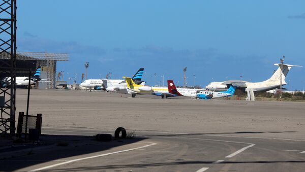 Airplanes are seen at Mitiga airport - Sputnik International