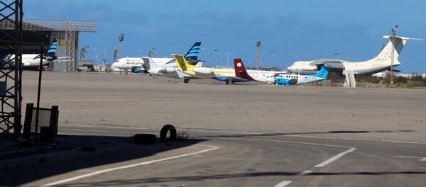 Airplanes are seen at Mitiga airport Airplanes are seen at Mitiga airport - Sputnik International