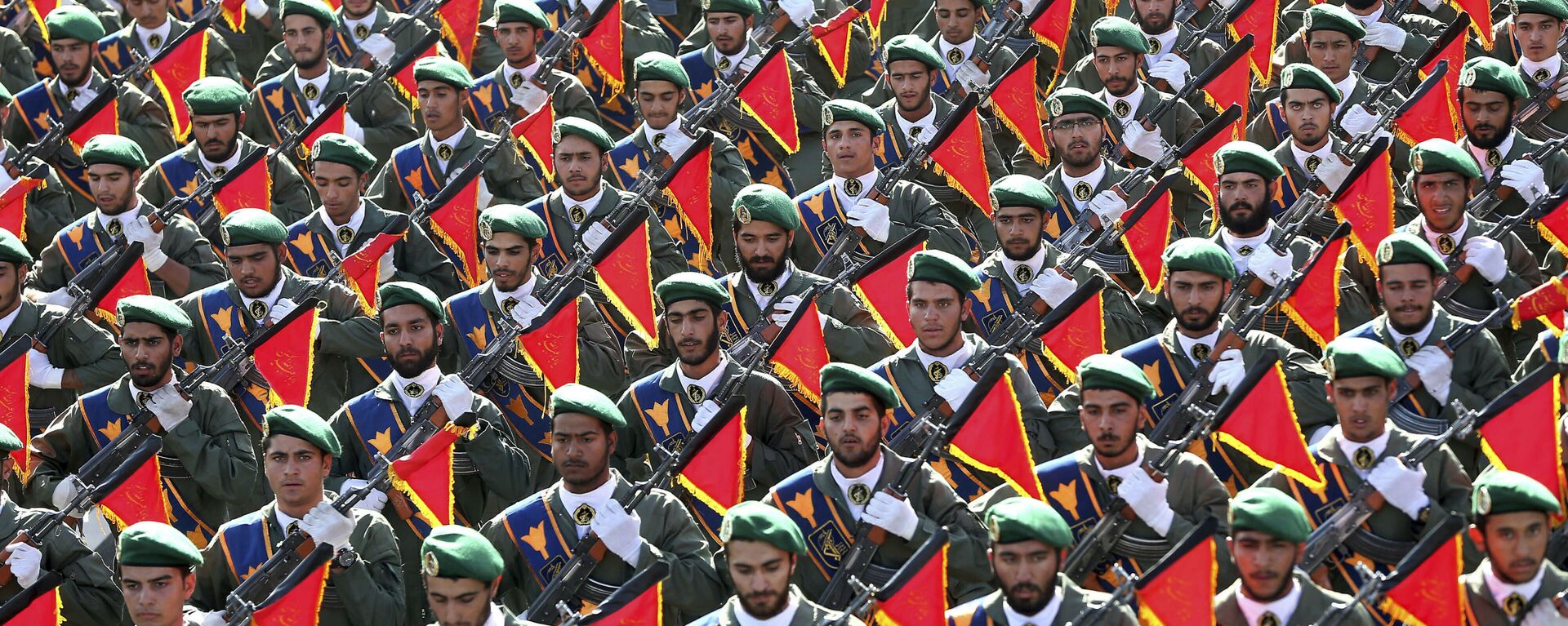 In this 21 September 2016 file photo, Iran's Revolutionary Guard troops march in a military parade marking the 36th anniversary of Iraq's 1980 invasion of Iran, in front of the shrine of late revolutionary founder Ayatollah Khomeini, just outside Tehran, Iran.  - Sputnik International, 1920, 29.11.2020