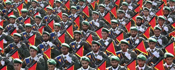In this Sept. 21, 2016 file photo, Iran's Revolutionary Guard troops march in a military parade marking the 36th anniversary of Iraq's 1980 invasion of Iran, in front of the shrine of late revolutionary founder Ayatollah Khomeini, just outside Tehran, Iran.  - Sputnik International
