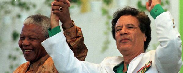 Muammar Gaddafi and Nelson Mandela, file photo. Muammar Gaddafi and Nelson Mandela, file photo. - Sputnik International
