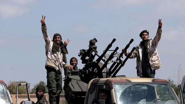 Libyan National Army (LNA) members, commanded by Khalifa Haftar, head out of Benghazi to reinforce the troops advancing to Tripoli, in Benghazi, Libya April 7, 2019 - Sputnik International