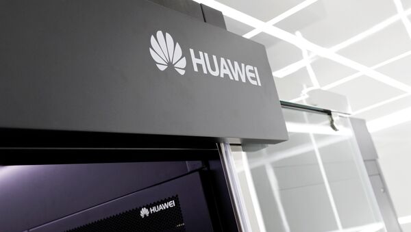 Logos of Huawei are seen on a device at its showroom in Shenzhen, Guangdong province, China, 29 March, 2019 - Sputnik International