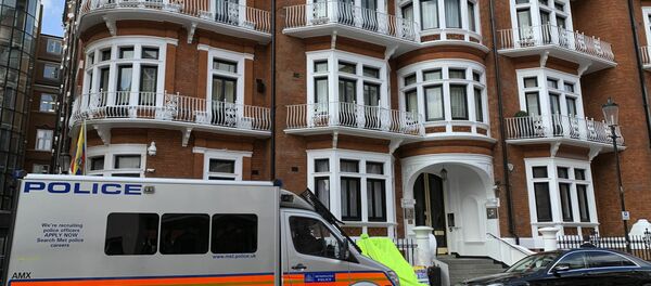 A police van parked outside the Ecuadorian Embassy in London, after WikiLeaks founder Julian Assange was arrested by officers from the Metropolitan Police and taken into custody Thursday April 11, 2019 A police van parked outside the Ecuadorian Embassy in London, after WikiLeaks founder Julian Assange was arrested by officers from the Metropolitan Police and taken into custody Thursday April 11, 2019 - Sputnik International