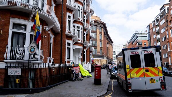 A police van is pictured outside of the Embassy of Ecuador in London on April 11, 2019, after police arrested WikiLeaks founder Julian Assange - Sputnik International