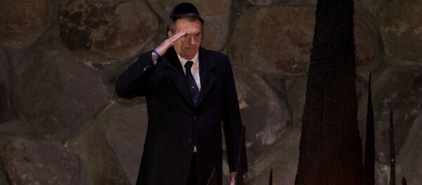 Brazil's President Jair Bolsonaro salutes during a ceremony commemorating the six million Jews killed by the Nazis during the Holocaust, in the Hall of Remembrance at Yad Vashem World Holocaust Remembrance Center Jerusalem, Tuesday, April 2, 2019. Brazil's President Jair Bolsonaro salutes during a ceremony commemorating the six million Jews killed by the Nazis during the Holocaust, in the Hall of Remembrance at Yad Vashem World Holocaust Remembrance Center Jerusalem, Tuesday, April 2, 2019. - Sputnik International