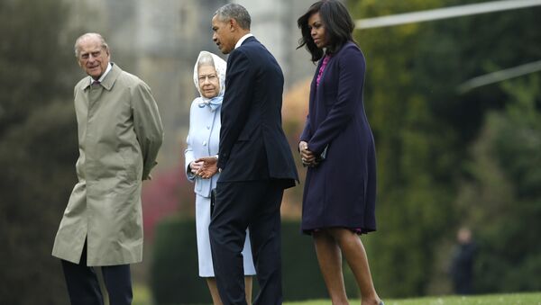 President Barack Obama and his wife first lady Michelle Obama are greeted by Britain's Queen Elizabeth II and Prince Phillip after landing by helicopter at Windsor Castle for a private lunch in Windsor, England, Friday, April, 22, 2016 - Sputnik International