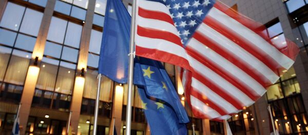 US and EU flags flutter in front of the EU headquarters in Brussels (File) US and EU flags flutter in front of the EU headquarters in Brussels (File) - Sputnik International