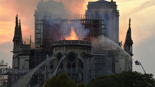 Notre Dame Cathedral engulfed in flames. Paris, France on 15 April, 2019 - Sputnik International
