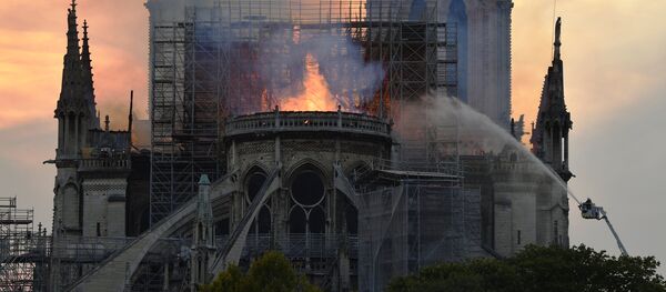 Notre Dame Cathedral engulfed in flames. Paris, France on 15 April, 2019 Notre Dame Cathedral engulfed in flames. Paris, France on 15 April, 2019 - Sputnik International