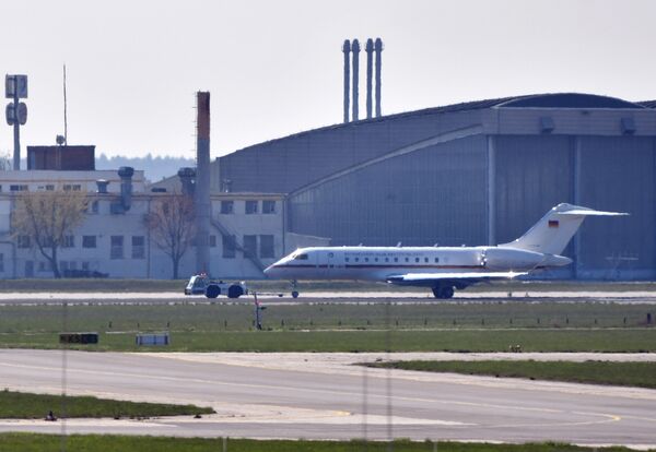 A Global 5000 jet of the government is towed over a taxiway at Schoenefeld Airport in Berlin, on April 16, 2019. After a malfunction shortly after take-off, the aircraft was reversed and landed at Berlin-Schönefeld Airport with major problems A Global 5000 jet of the government is towed over a taxiway at Schoenefeld Airport in Berlin, on April 16, 2019. After a malfunction shortly after take-off, the aircraft was reversed and landed at Berlin-Schönefeld Airport with major problems - Sputnik International