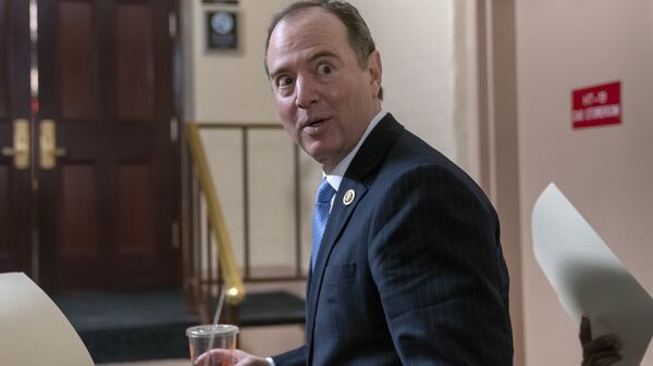 House Intelligence Committee Chairman Adam Schiff, D-Calif., arrives for a Democratic Caucus meeting at the Capitol in Washington, Tuesday, March 26, 2019. Schiff, the focus of Republicans' post-Mueller ire, says Mueller's conclusion would not affect his own committee's counterintelligence probes. - Sputnik International