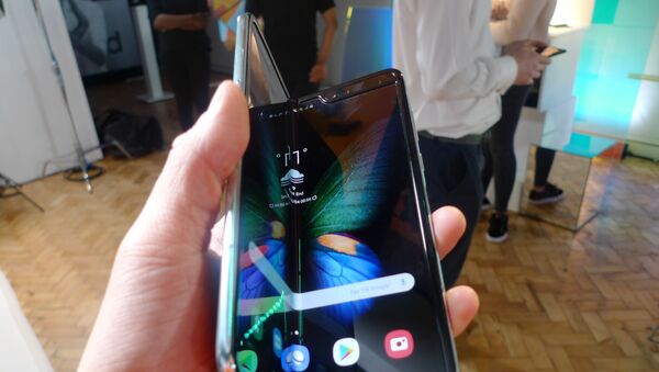 The Samsung Galaxy Fold smartphone is seen during a media preview event in London, Tuesday April 16, 2019. Samsung is hoping the innovation of smartphones with folding screens reinvigorates the market. - Sputnik International