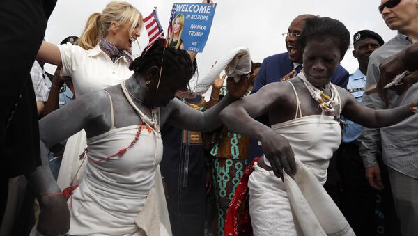 U.S. White House senior adviser Ivanka Trump, back left, joins in with traditional dancers as she is welcomed by local people on arrival to Adzope, Ivory Coast, Wednesday April 17, 2019, where she will visit Cayat, a cocoa and coffee collective - Sputnik International