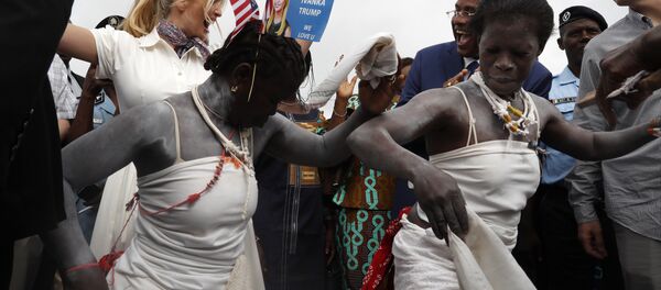 U.S. White House senior adviser Ivanka Trump, back left, joins in with traditional dancers as she is welcomed by local people on arrival to Adzope, Ivory Coast, Wednesday April 17, 2019, where she will visit Cayat, a cocoa and coffee collective U.S. White House senior adviser Ivanka Trump, back left, joins in with traditional dancers as she is welcomed by local people on arrival to Adzope, Ivory Coast, Wednesday April 17, 2019, where she will visit Cayat, a cocoa and coffee collective - Sputnik International