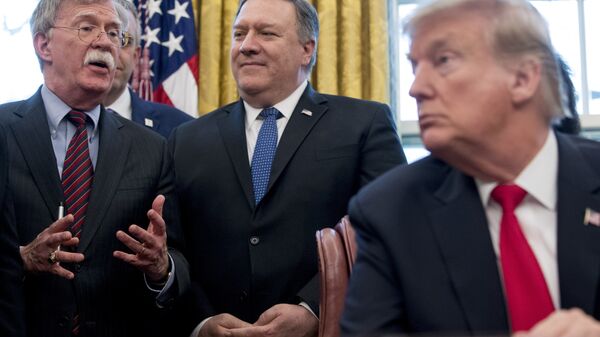From left, National Security Adviser John Bolton, accompanied by Secretary of State Mike Pompeo and President Donald Trump - Sputnik International