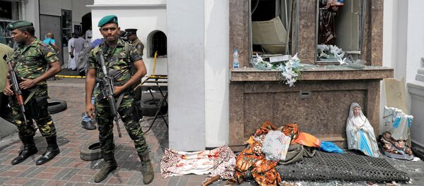 Sri Lankan military officials stand guard in front of the St. Anthony's Shrine, Kochchikade church after an explosion in Colombo, Sri Lanka April 21, 2019. - Sputnik International