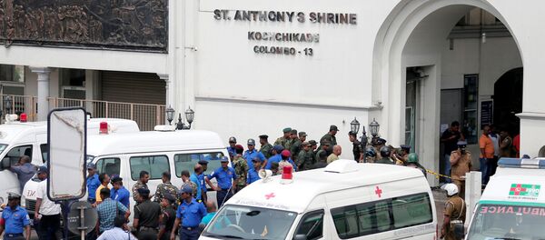 Sri Lankan military officials stand guard in front of the St. Anthony's Shrine, Kochchikade church after an explosion in Colombo, Sri Lanka April 21, 2019. - Sputnik International