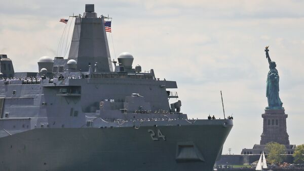 The USS Arlington, from Norfolk, Va., a San Antonio-class amphibious transport dock with several hundred Marines from Camp Lejeune, N.C., arrives on the Hudson River to kickoff 2018 Fleet Week New York, Wednesday May 23, 2018, in New York. - Sputnik International