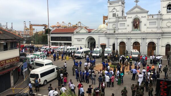 Sri Lankan military officials stand guard in front of the St. Anthony's Shrine, Kochchikade church after an explosion in Colombo, Sri Lanka April 21, 2019 - Sputnik International