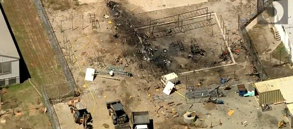 Aftermath of Vintage Northrop N-9M Plane Crashing Into California Prison Yard, Killing Pilot - Sputnik International