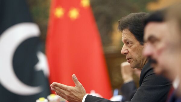 Pakistan's Prime Minister Imran Khan attends talks with Chinese President Xi Jinping (not pictured) at the Great Hall of the People in Beijing, Friday, Nov. 2, 2018 - Sputnik International