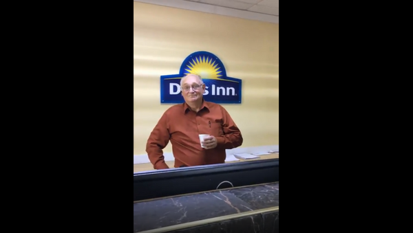 Hotel clerk from a Virginia Days Inn gets fired after verbally harassing a customer who grabbed a yogurt from a food bar. - Sputnik International