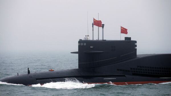 Chinese Navy's nuclear-powered submarine Long March 11 takes part in a naval parade off the eastern port city of Qingdao, to mark the 70th anniversary of the founding of Chinese People's Liberation Army Navy - Sputnik International