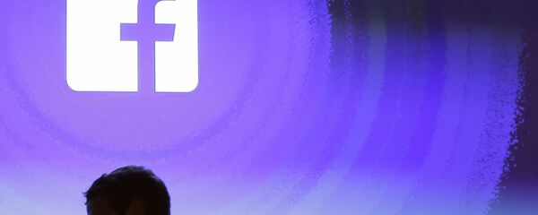 April 4, 2013 file photo, Facebook CEO Mark Zuckerberg walks at the company's headquarters in Menlo Park, Calif. April 4, 2013 file photo, Facebook CEO Mark Zuckerberg walks at the company's headquarters in Menlo Park, Calif. - Sputnik International