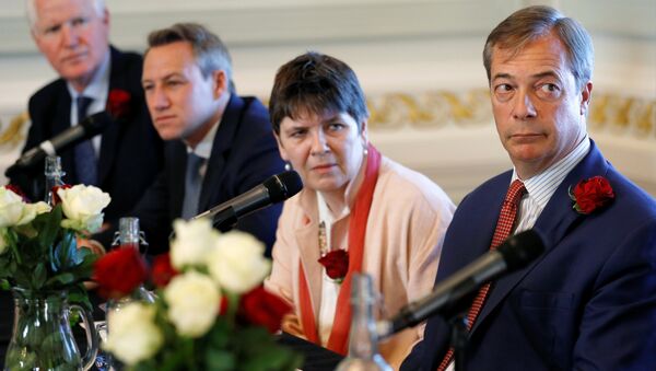 Brexit campaigner and Member of the European Parliament Nigel Farage, Claire Fox, James Glancy and Matthew Patten, candidates of Brexit party, look on during a news conference by the 'Brexit Party' campaign for the European elections, in London, Britain April 23, 2019 - Sputnik International
