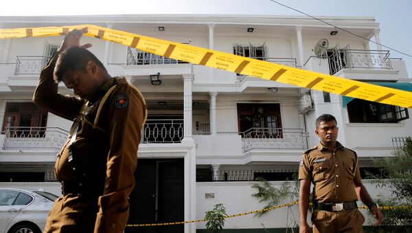 Police keep watch outside the family home of a bomber suspect where an explosion occurred during a Special Task Force raid, following a string of suicide attacks on churches and luxury hotels, in Colombo, Sri Lanka April 25, 2019. - Sputnik International