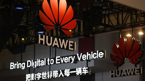 Signs are displayed at the Huawei stand at the Shanghai Auto Show in Shanghai on April 17, 2019 - Sputnik International