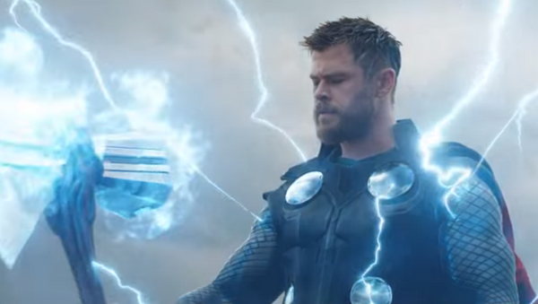 Hammer-wielding Norse god Thor is seen in image, portrayed by Australian actor Chris Hemsworth - Sputnik International