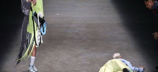 Model Tales Soares lies on the catwalk after he collapsed during Sao Paulo Fashion Week in Sao Paulo, Brazil, Saturday, April 27, 2019 Model Tales Soares lies on the catwalk after he collapsed during Sao Paulo Fashion Week in Sao Paulo, Brazil, Saturday, April 27, 2019 - Sputnik International